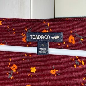 Toad and Co. medium. Maroon with mustard colored flowers. 3/4 length sleeve.